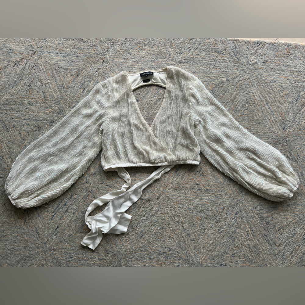 RETROFÊTE BRAND, Size S, worn 4 times, dry cleaning needed.